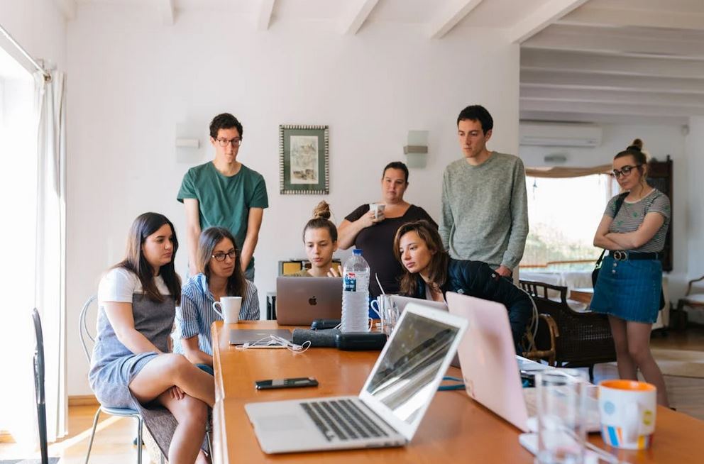 A sales team looking at their leads in a meeting